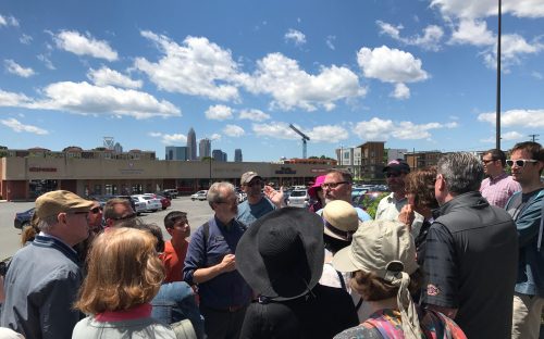 The May 6 history walk through Plaza Midwood, led by historian Tom Hanchett and Jeff Byers, took place amid a crowd of participants in Charlotte's successful Open Streets 704 event along Central Avenue. Photo: Diane Gavarkavich