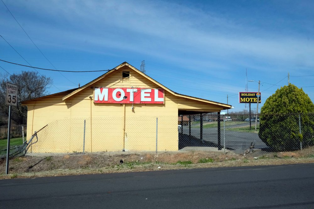 Real estate records show that the original Holiday Motel on this site was a 2.5-story structure built in 1948 and since demolished. This one-story structure near the new Tom Hunter Station was added in 1956 and is owned and operated by the Patel family. Photo: Nancy Pierce