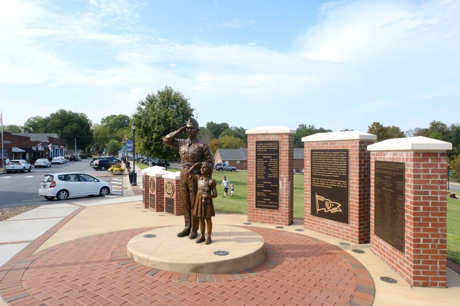 A Cramerton war memorial that also pays tribute to the town's heritage as a center of "Army khaki" production for uniforms. Photo: Nancy Pierce.