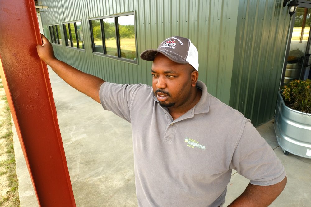 Davon Goodwin, manager of Sandhills AGInnovation Center in Ellerbee, NC, looks out over the fields. Photo: Nancy Pierce