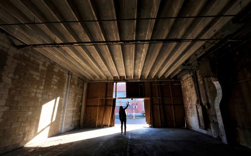 Warehouses once used to store missiles will be rented for small entrepreneurial and creative space, says Varian Shrum, ATCO Properties' community manager at CAMP North End, shown here.