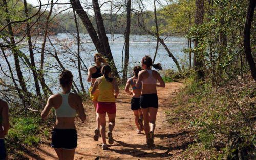 Runners jog along the Broad River Greenway in April 2010.