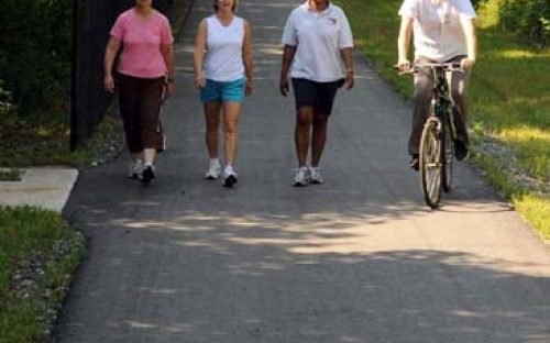 A group exercises along Gastonia's Highland Rail Trail in May 2010.