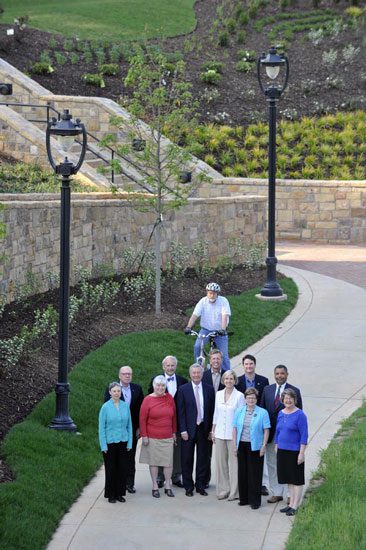 Community leaders pose to celebrate opening the most recent part of Charlotte's Little Sugar Creek Greenway in March 2012.