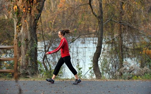 A woman walks along the Piedmont Medical Center Trail in November 2011.