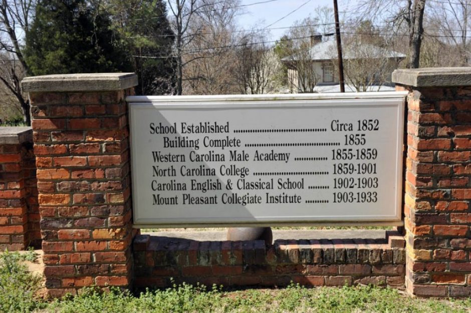 Sign showing previous uses of the Western Carolina Male Academy.