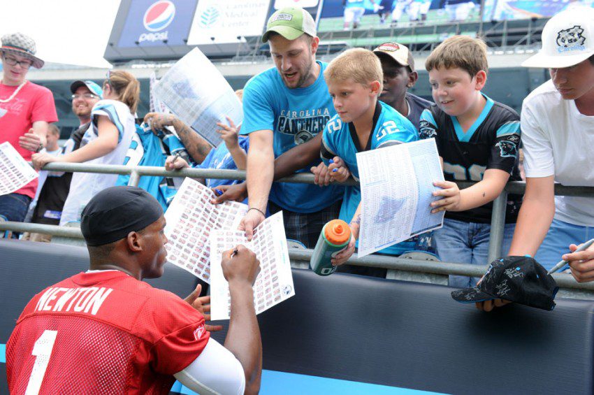 Already a fan favorite, Cam Newton signs autographs at Panthers Fan Fest on Aug.6.