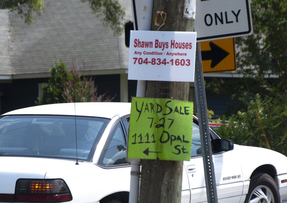 Offers from investors to buy houses are common in gentrifying west Charlotte neighborhoods - in person, over the phone, via mail and on telephone poles. Photo: Ely Portillo.