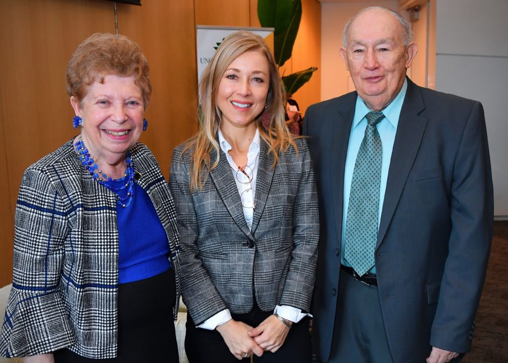 Marianne and Norm Schul flank Sarah Smarsh at the 2019 Schul Forum