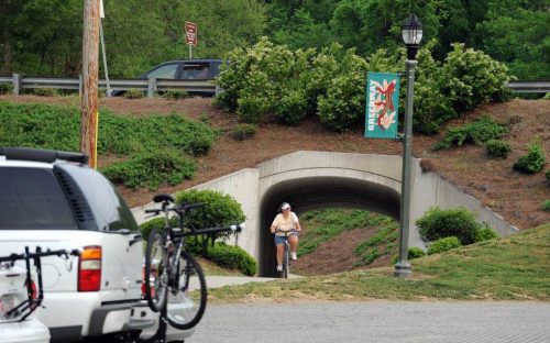 A bridge allows pedestrians and riders to go under the road at McEachern Greenway in May 2010.