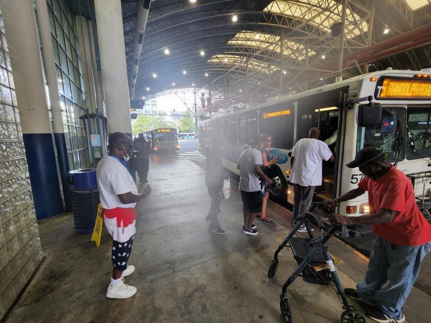 Passengers at the Charlotte Transit Center. The city is considering moving uptown's main bus station underground. (Photo by Steve Harrison/WFAE)