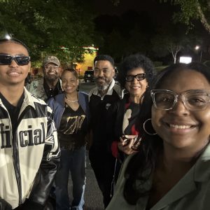 Mia Gaddy and members of her family with her uncle, Ezra "Tic" Means.