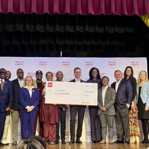 Grantees of Wells Fargo's $6M West Charlotte investment receive grant check alongside elected officials, bank and educational leaders. Photo: Asha Ellison