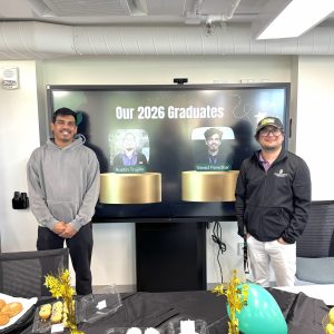 Photo: Varad Paradkar (left) and Austin Trujillo (right) at the Institute's graduate celebration in April.