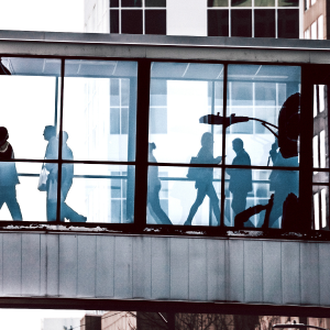 People walk in an elevated walkway in Uptown Charlotte. Photo: Peeter V.