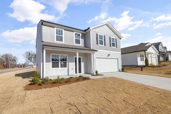 A photo of a new construction two-story home.