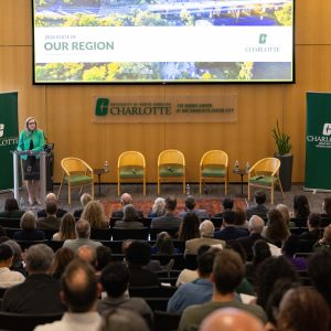 UNC Charlotte Chancellor Sharon L. Gaber welcomes guests to the Charlotte Urban Institute’s inaugural State of Our Region. Photo: Amy Hart. 